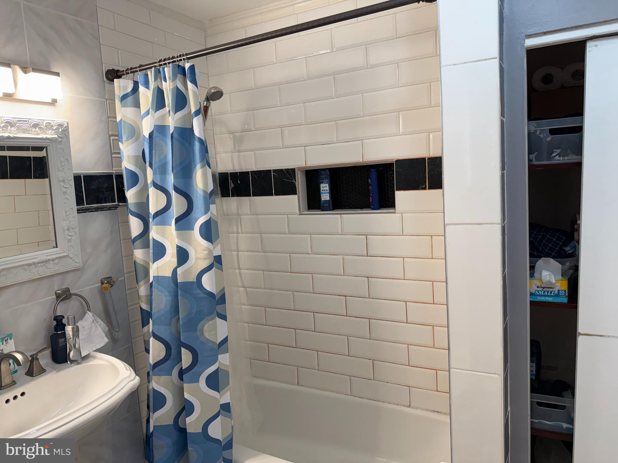 305 Lincoln Avenue Maple Shade, NJ 08052 - Photo 10 of 23 a bathroom with a sink a toilet and shower