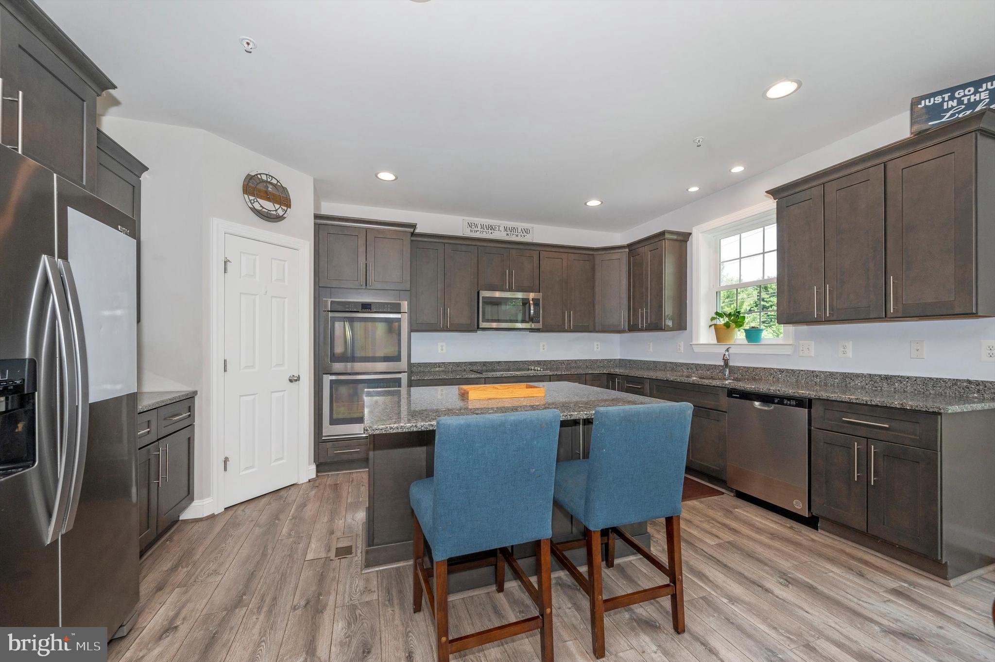 7146 Masters Road New Market, MD 21774 - Photo 9 of 28 Kitchen with Center Island and Large Pantry