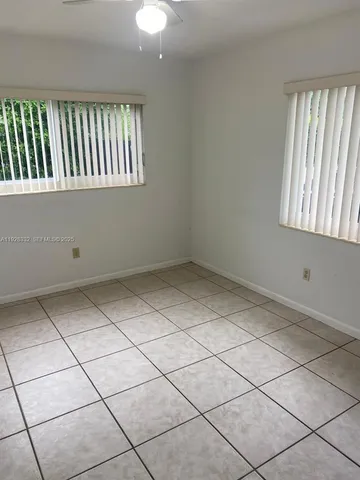 a view of a room with a window