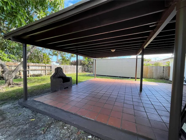 a view of a backyard of a house
