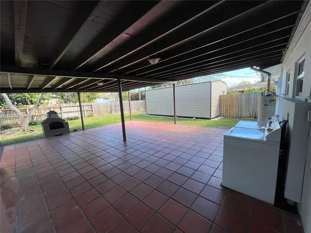 a view of a backyard of a house