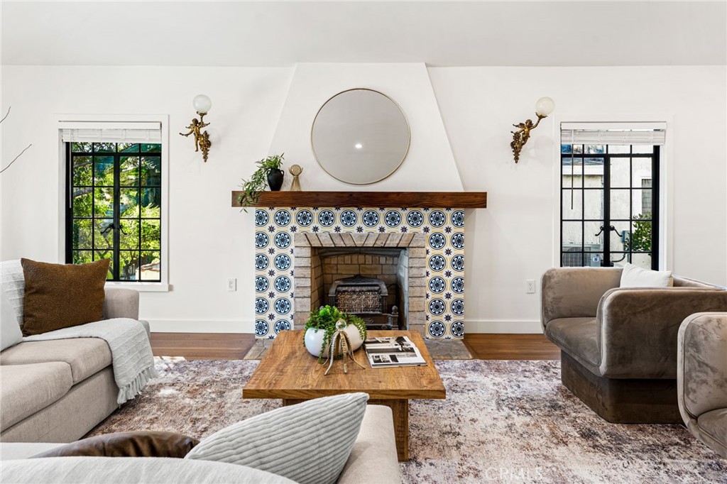 1201 Montecito Drive Montecito Heights, CA 90031 - Photo 14 of 71 a living room with furniture and a fireplace