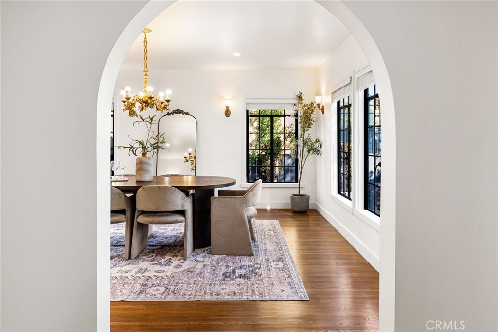 1201 Montecito Drive Montecito Heights, CA 90031 - Photo 16 of 71 a living room with furniture rug and wooden floor
