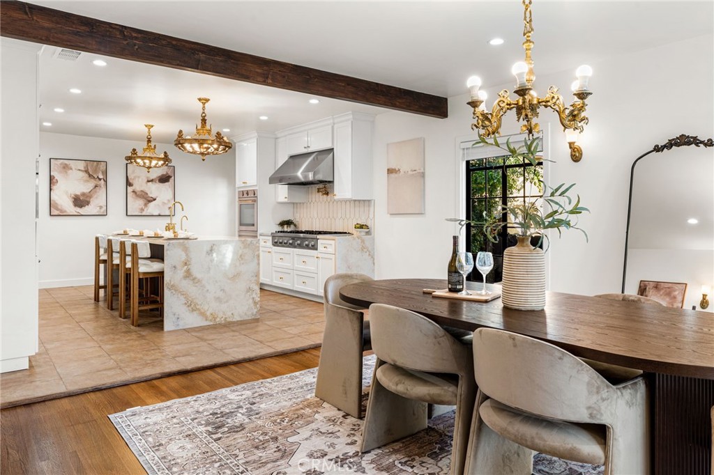 1201 Montecito Drive Montecito Heights, CA 90031 - Photo 20 of 71 a dining room with furniture and chandelier