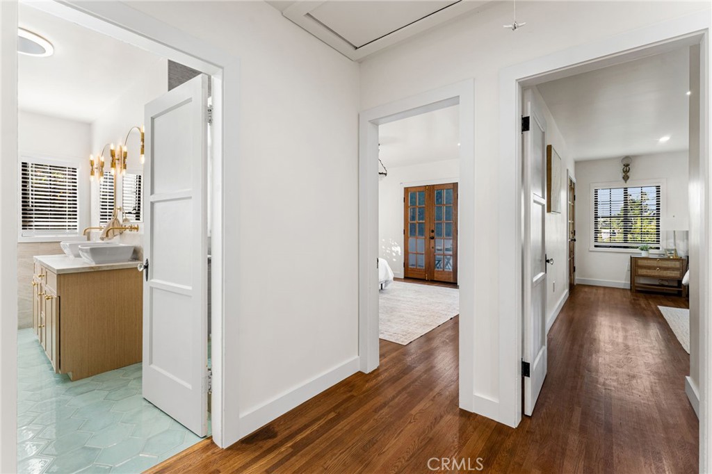 1201 Montecito Drive Montecito Heights, CA 90031 - Photo 28 of 71 a view of a hallway with wooden floor windows and a living room