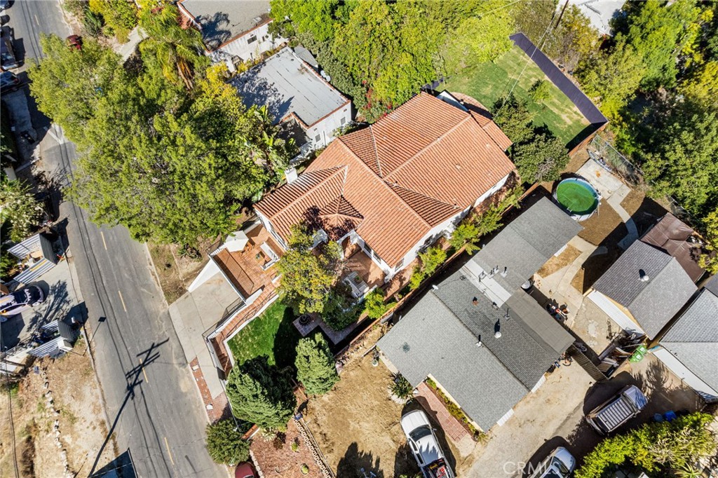 1201 Montecito Drive Montecito Heights, CA 90031 - Photo 56 of 71 an aerial view of a house with a yard and a wooden deck