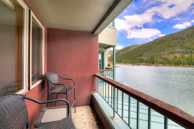 a view of balcony with furniture