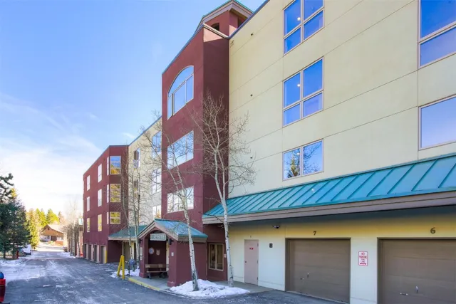 a front view of a building with glass windows