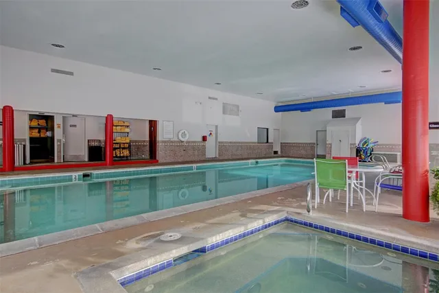 a view of a house with a yard from a porch