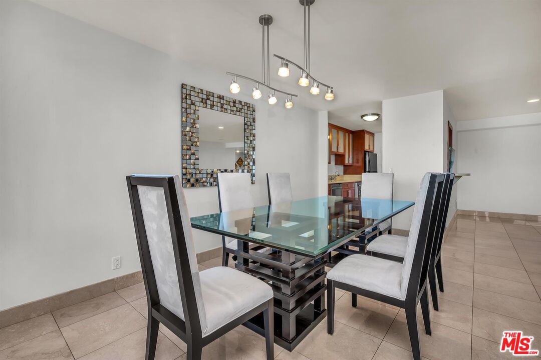 865 Comstock Avenue, Unit 4C Los Angeles, CA 90024 - Photo 15 of 26 a view of a dining room with furniture