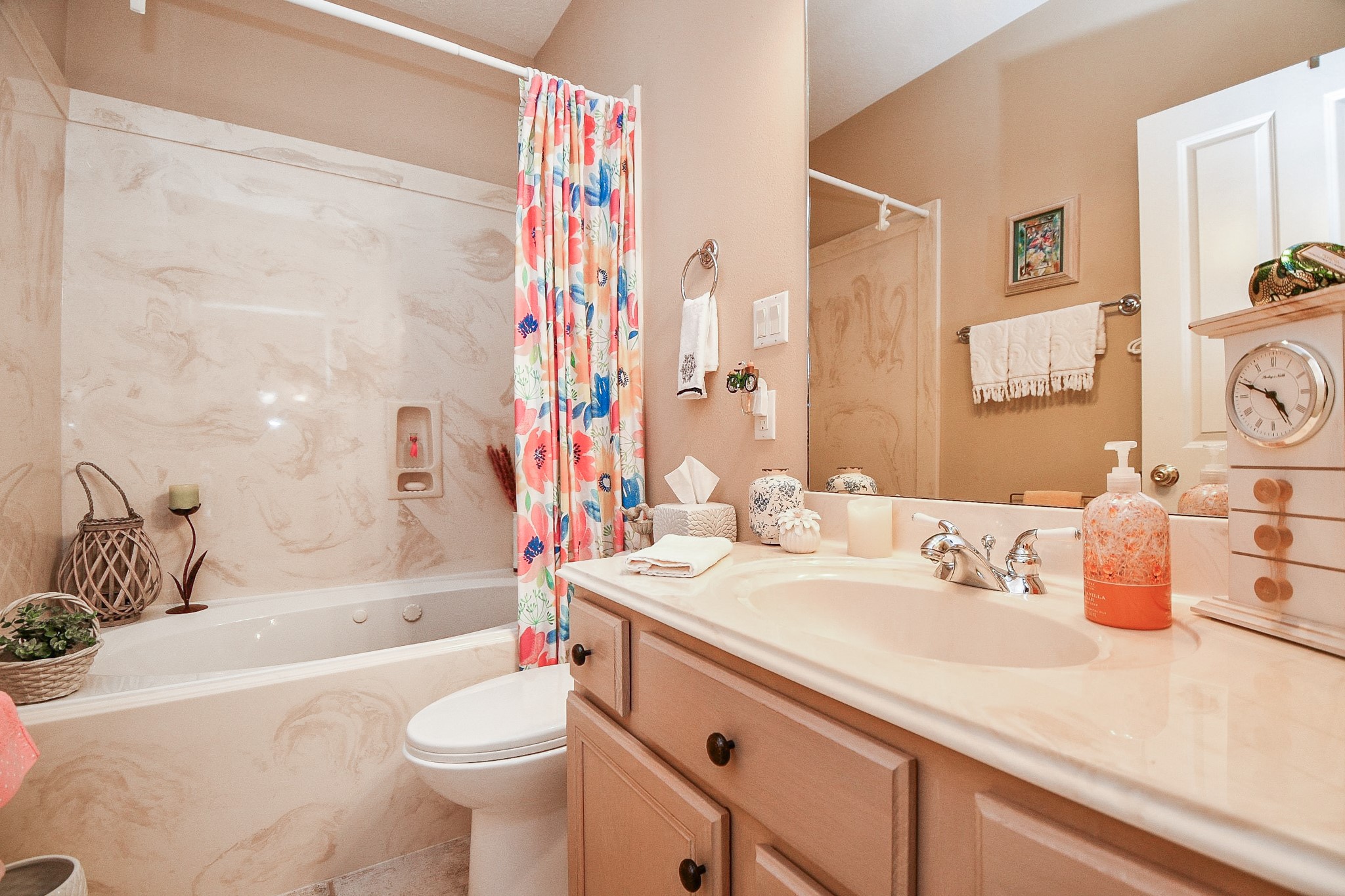 3680 Eula Morgan Road Katy, TX 77493 - Photo 45 of 50 Muted earth tones bathe this secondary bathroom in the guest house (with combined shower/bathtub) in warm vibes.