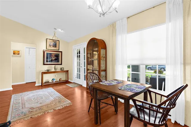 a view of a livingroom with furniture and a table