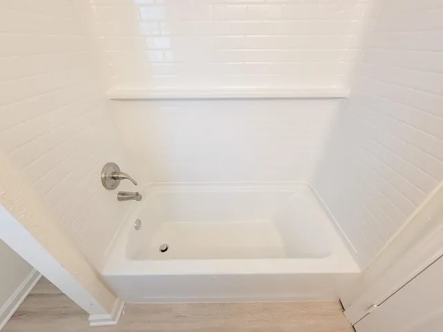 a close up of a bathtub