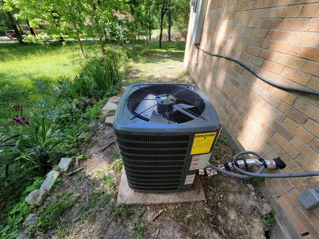 a view of a back yard of the house and a car park