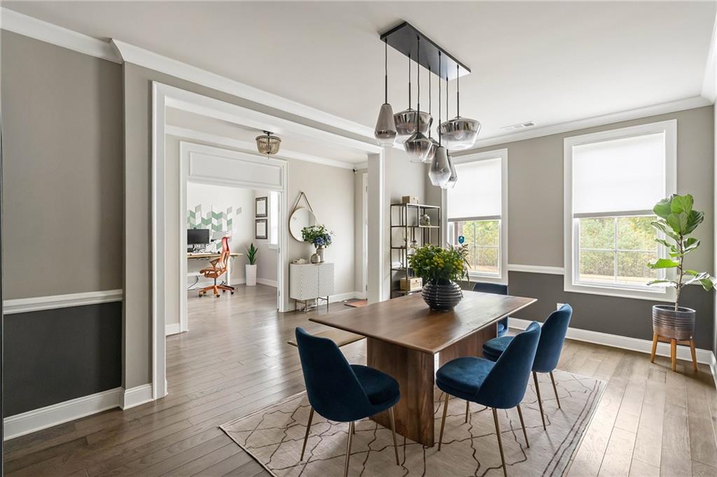 550 Central Park Overlook Alpharetta, GA 30004 - Photo 16 of 51 a view of a dining room with furniture window and wooden floor