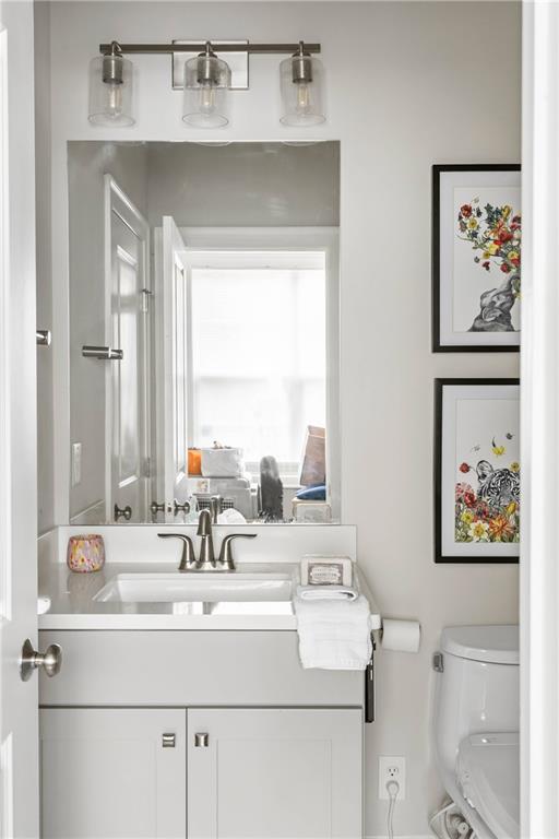 550 Central Park Overlook Alpharetta, GA 30004 - Photo 18 of 51 a bathroom with a sink mirror and a window