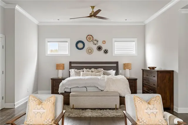 a bedroom with two beds and a table