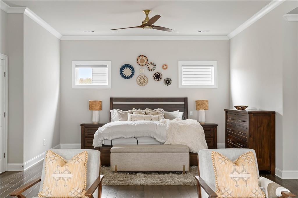 550 Central Park Overlook Alpharetta, GA 30004 - Photo 21 of 51 a bedroom with a bed and a couch