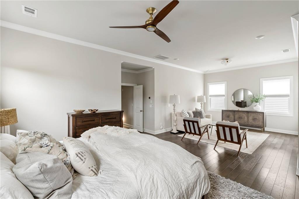 550 Central Park Overlook Alpharetta, GA 30004 - Photo 22 of 51 a bedroom with two beds and a table