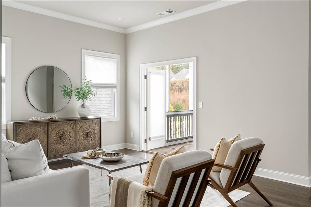 550 Central Park Overlook Alpharetta, GA 30004 - Photo 24 of 51 a living room with furniture and a window
