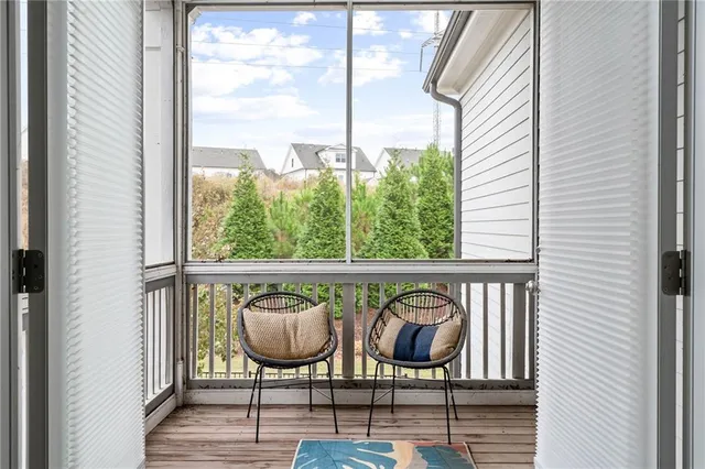 a bed room with a bed and a window