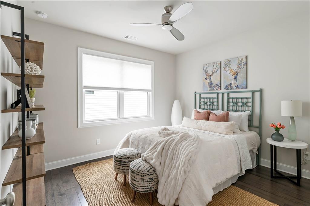 550 Central Park Overlook Alpharetta, GA 30004 - Photo 30 of 51 a bedroom with bed and a window