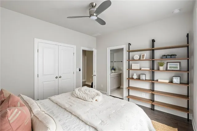 a bedroom with a bed and a sink