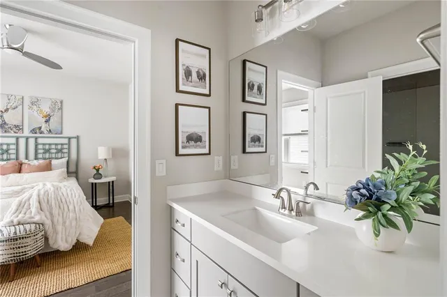 a living room with furniture and a mirror