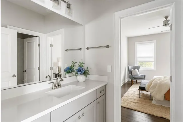 a bedroom with bed and window