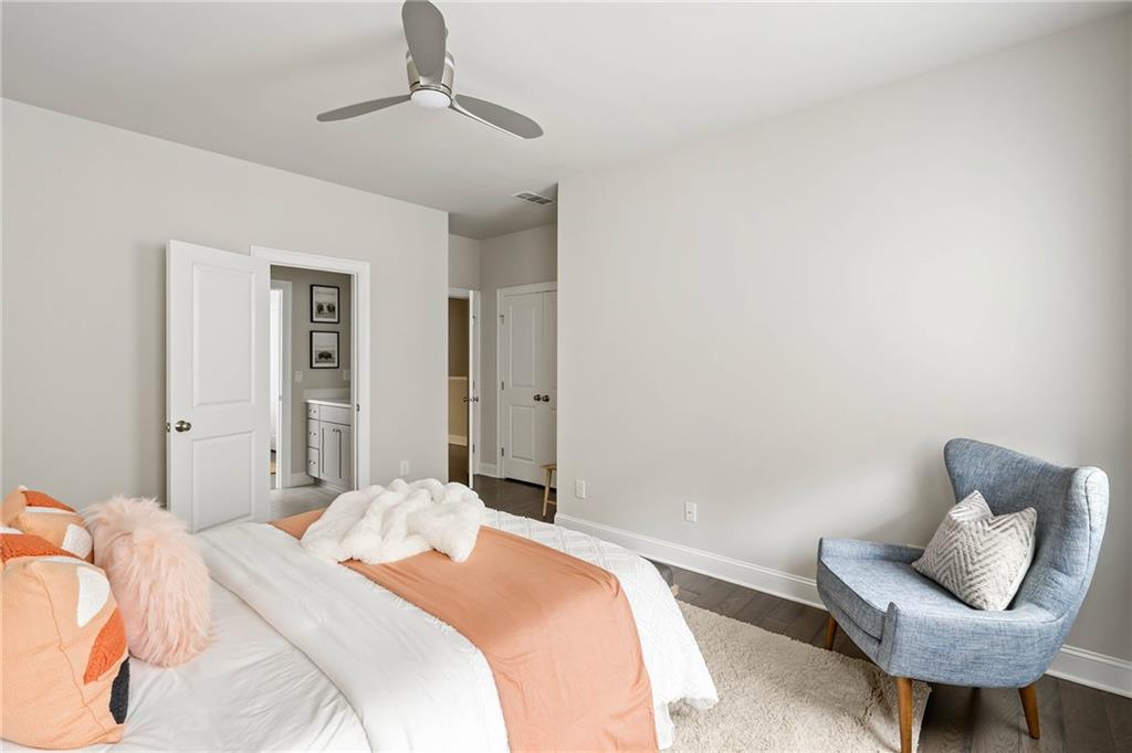 550 Central Park Overlook Alpharetta, GA 30004 - Photo 35 of 51 a bedroom with a bed chair and couch