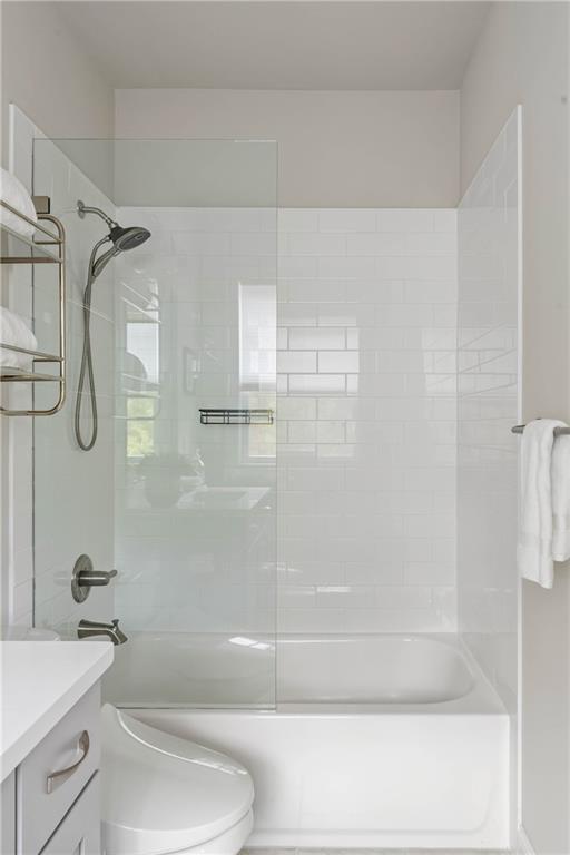 550 Central Park Overlook Alpharetta, GA 30004 - Photo 38 of 51 a bathroom with a granite countertop bathtub shower sink vanity and toilet