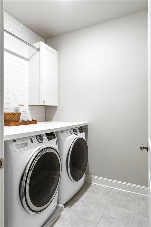 550 Central Park Overlook Alpharetta, GA 30004 - Photo 39 of 51 a utility room with dryer and washer