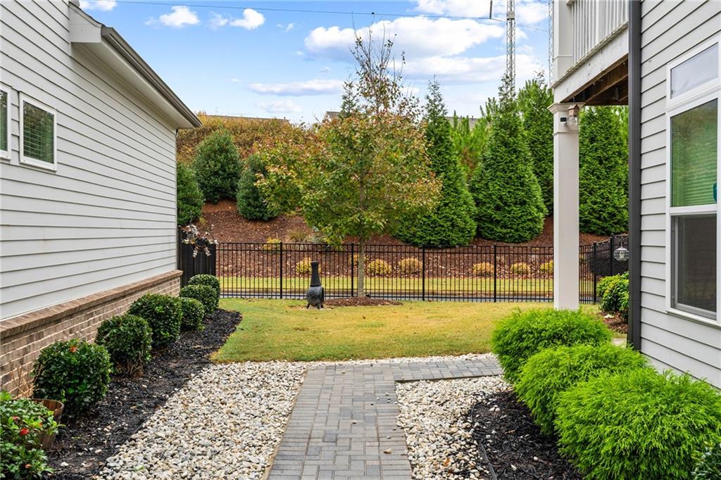 550 Central Park Overlook Alpharetta, GA 30004 - Photo 40 of 51 a view of a backyard with garden