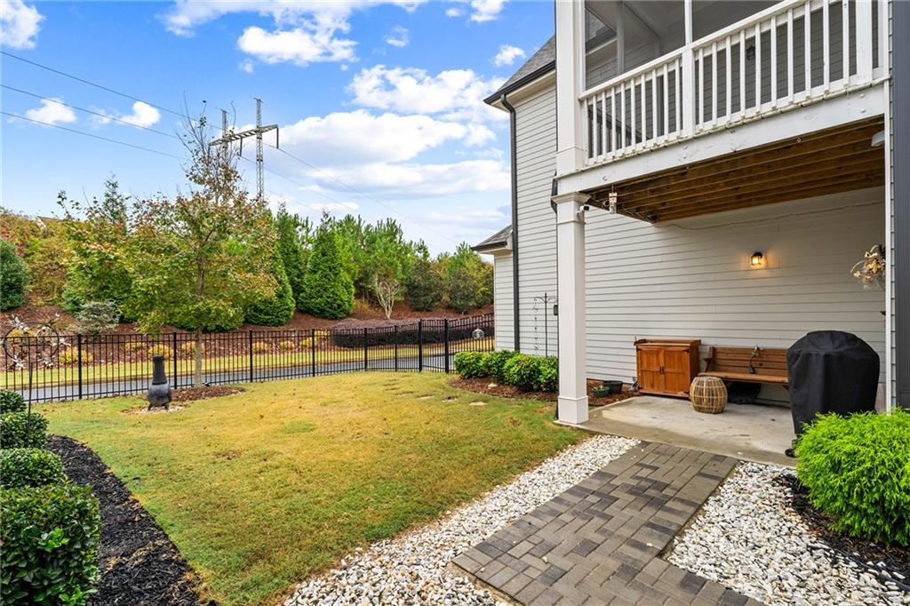 550 Central Park Overlook Alpharetta, GA 30004 - Photo 41 of 51 a view of a swimming pool with a patio and a yard