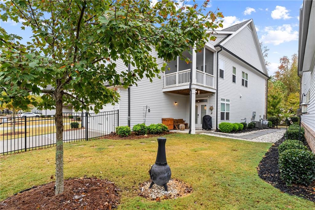 550 Central Park Overlook Alpharetta, GA 30004 - Photo 42 of 51 a front view of a house with yard