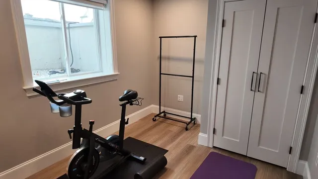 a view of a room with gym equipment