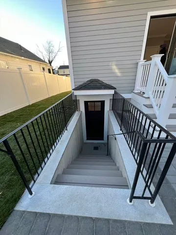 a view of balcony with wooden floor