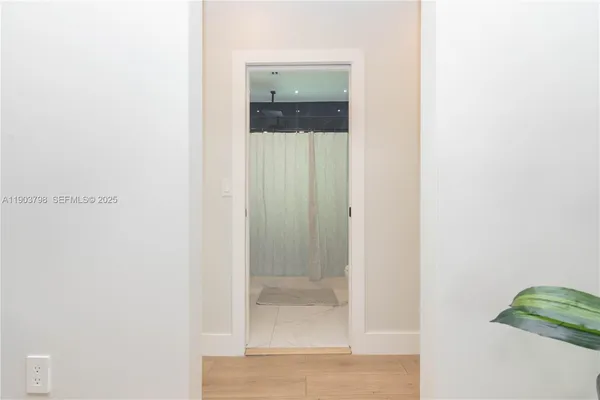 a room with a bed and a window