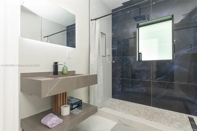 a room with a bed and a window