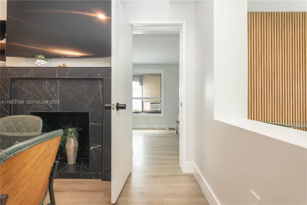 a kitchen with a sink and a refrigerator