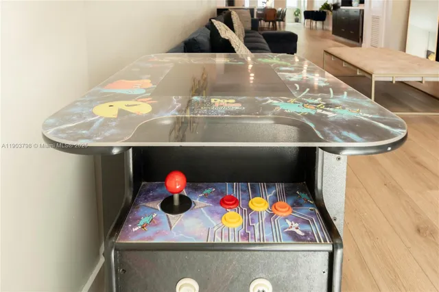 a bedroom with a large bed and a lamp