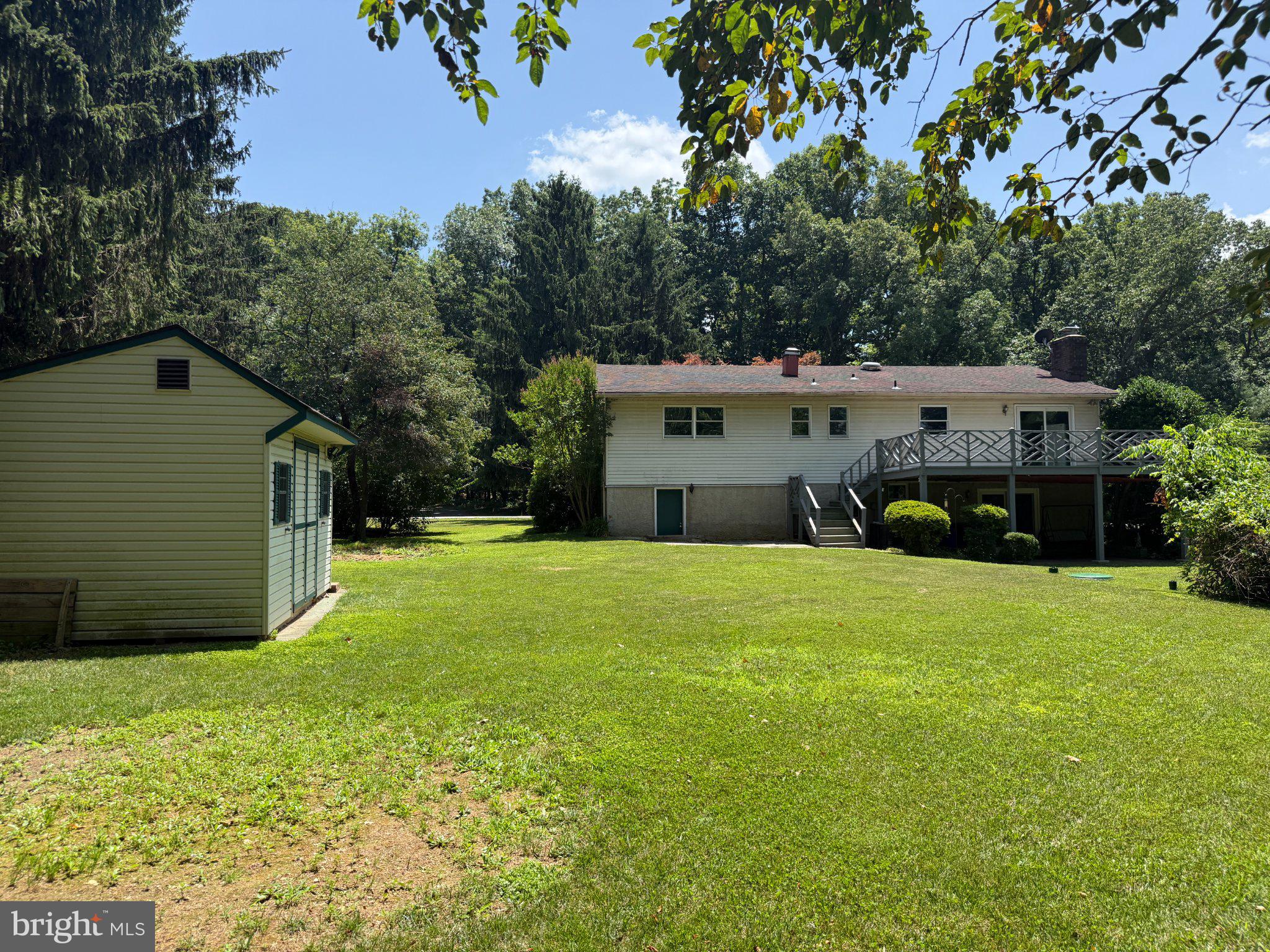 4 Martz Road Sykesville, MD 21784 - Photo 2 of 12 a view of a house with backyard and garden