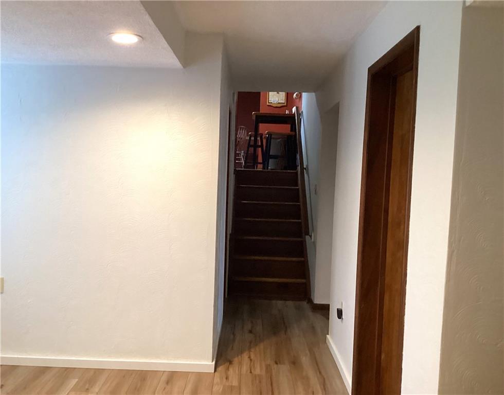 5719 Halchess Street Pittsburgh, PA 15207 - Photo 20 of 25 a view of a hallway with wooden floor and entryway