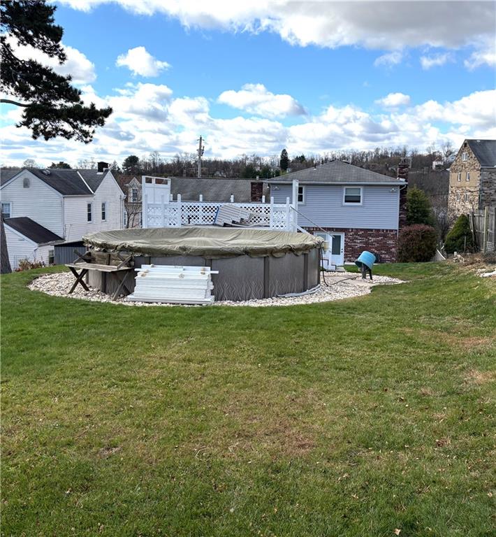 5719 Halchess Street Pittsburgh, PA 15207 - Photo 24 of 25 a view of a lake with a big yard