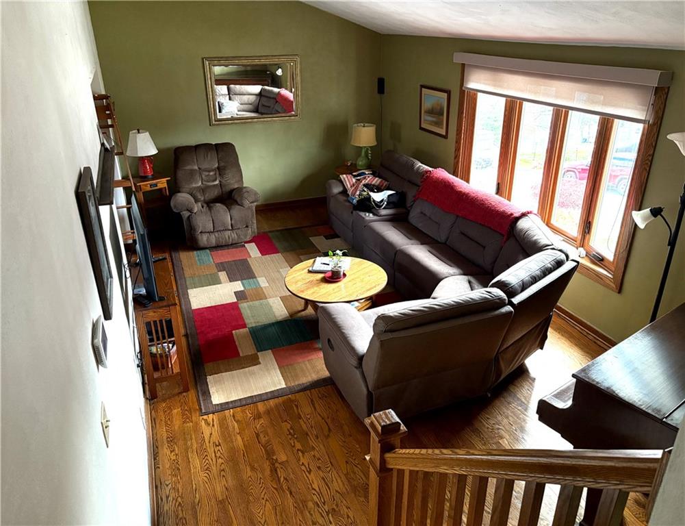 5719 Halchess Street Pittsburgh, PA 15207 - Photo 7 of 25 a living room with furniture and wooden floor