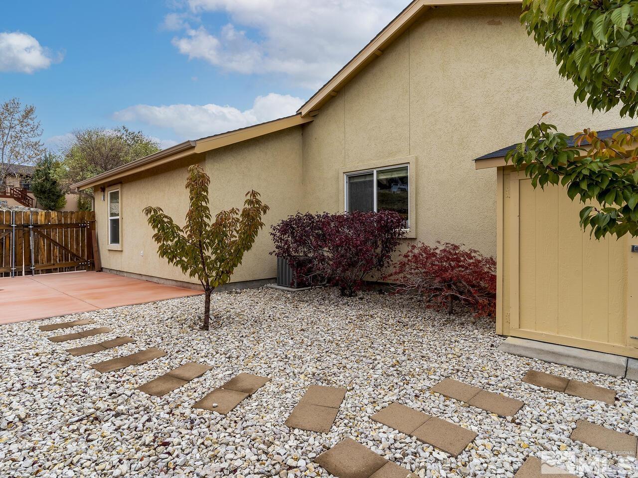 160 Hoge Road Reno, NV 89506 - Photo 14 of 19 a front view of a house with garden