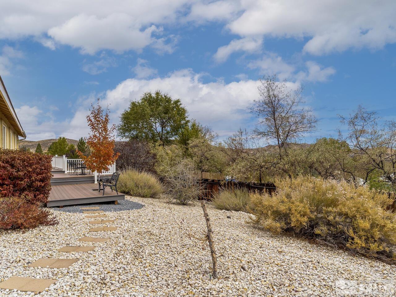 160 Hoge Road Reno, NV 89506 - Photo 18 of 19 a backyard of a house with lots of green space