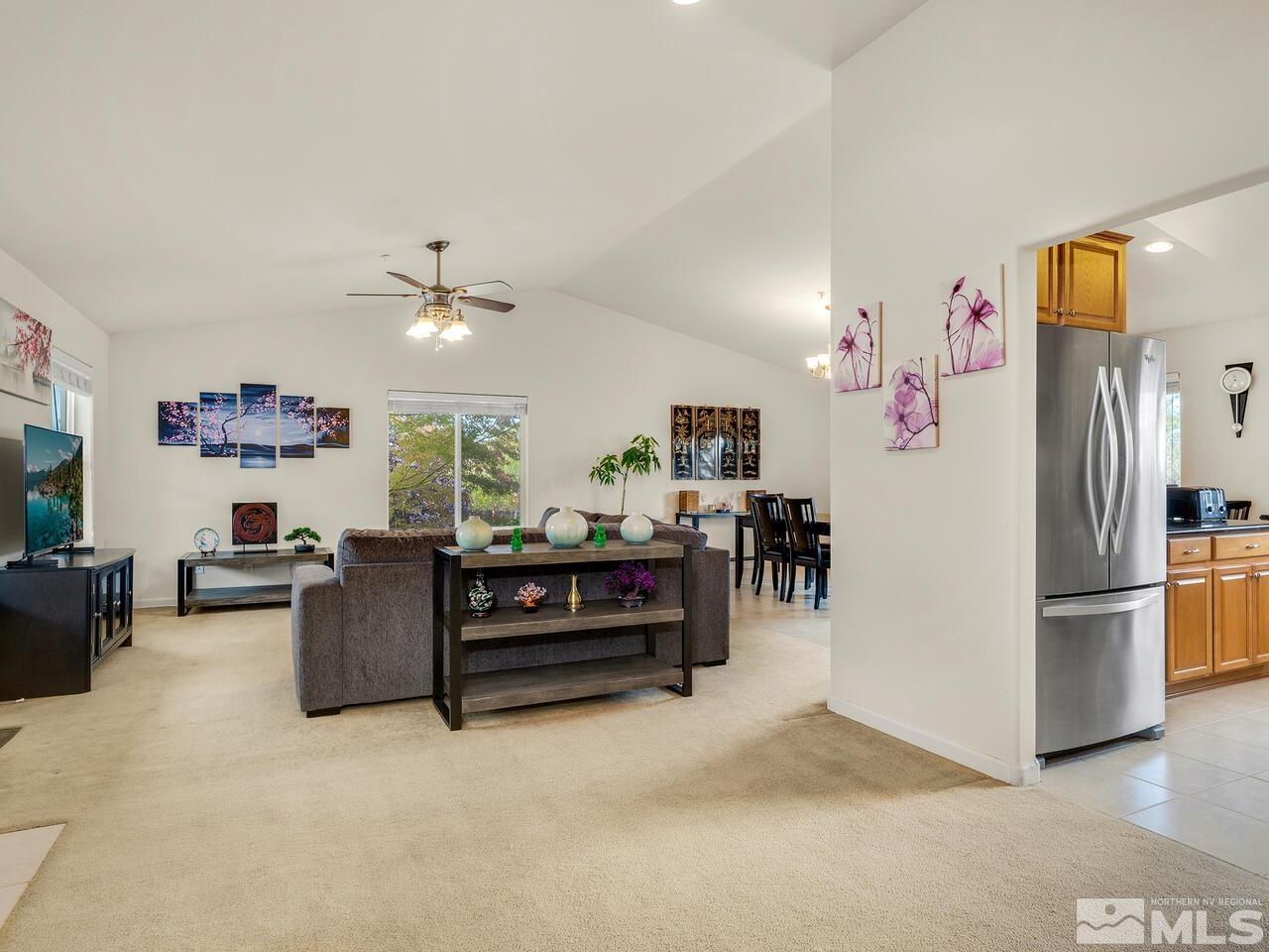 160 Hoge Road Reno, NV 89506 - Photo 3 of 19 a view of a livingroom with furniture and a flat screen tv