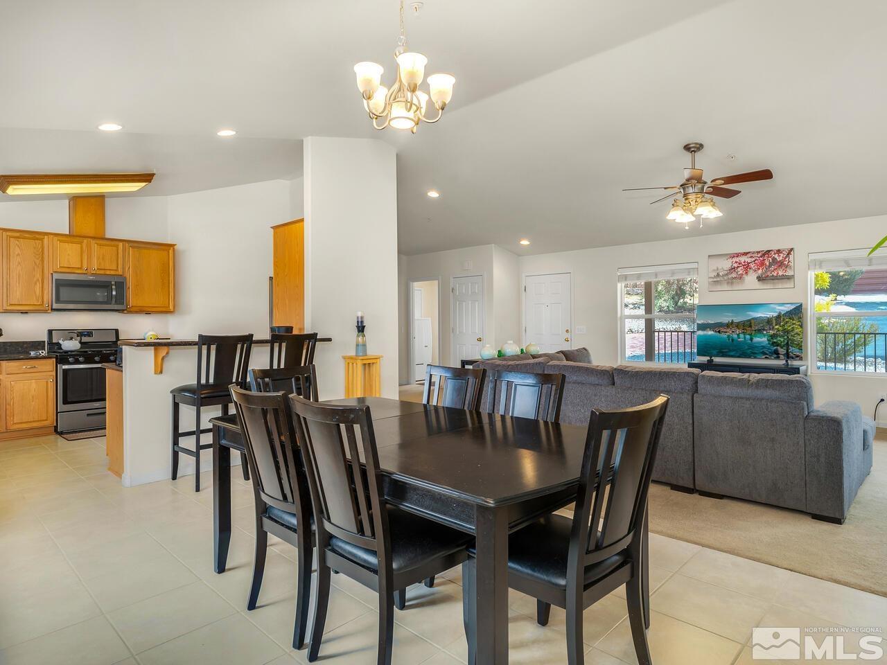 160 Hoge Road Reno, NV 89506 - Photo 5 of 19 a view of a dining room with furniture and chandelier