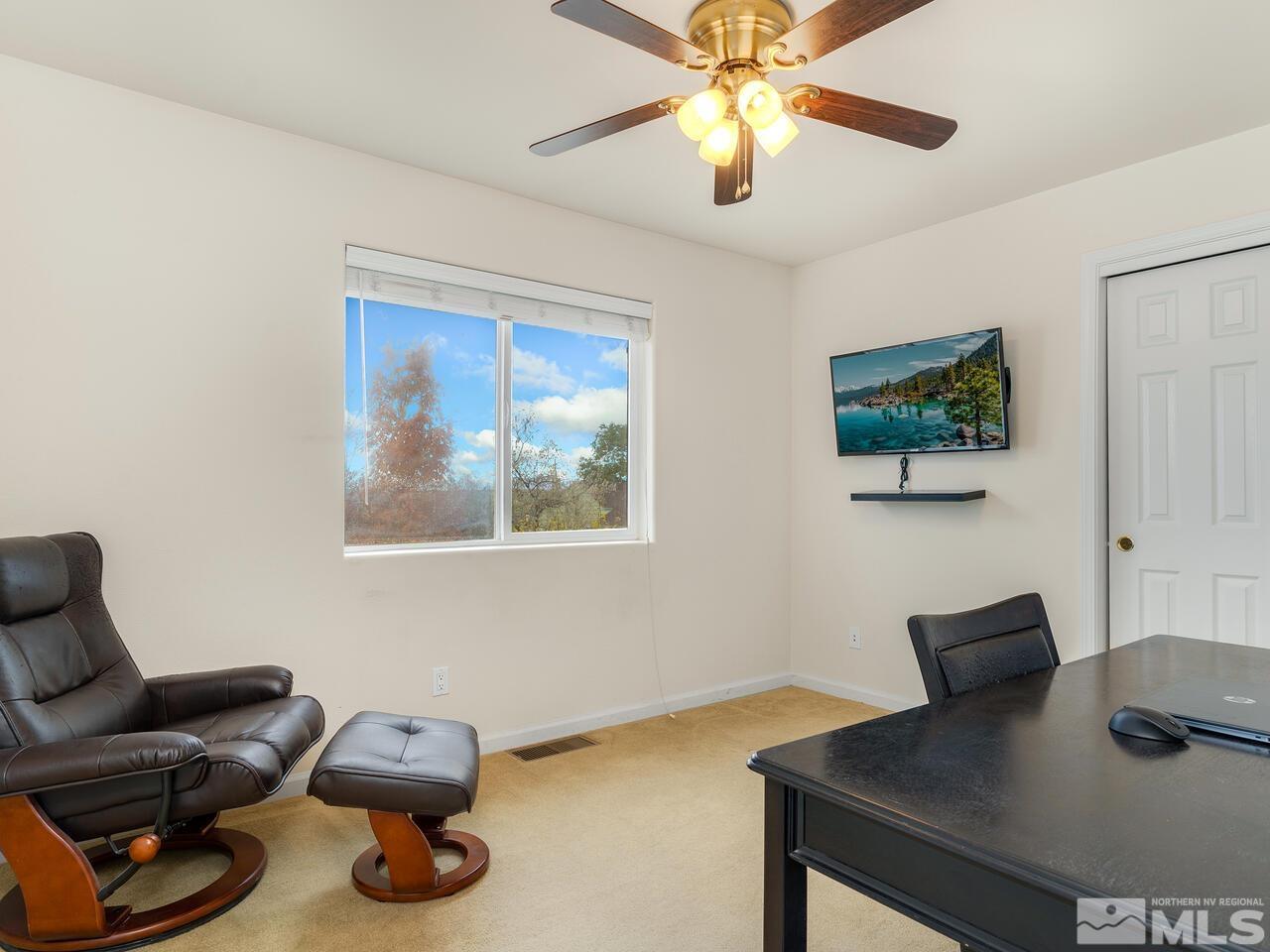 160 Hoge Road Reno, NV 89506 - Photo 10 of 19 a view of a workspace with furniture and a window